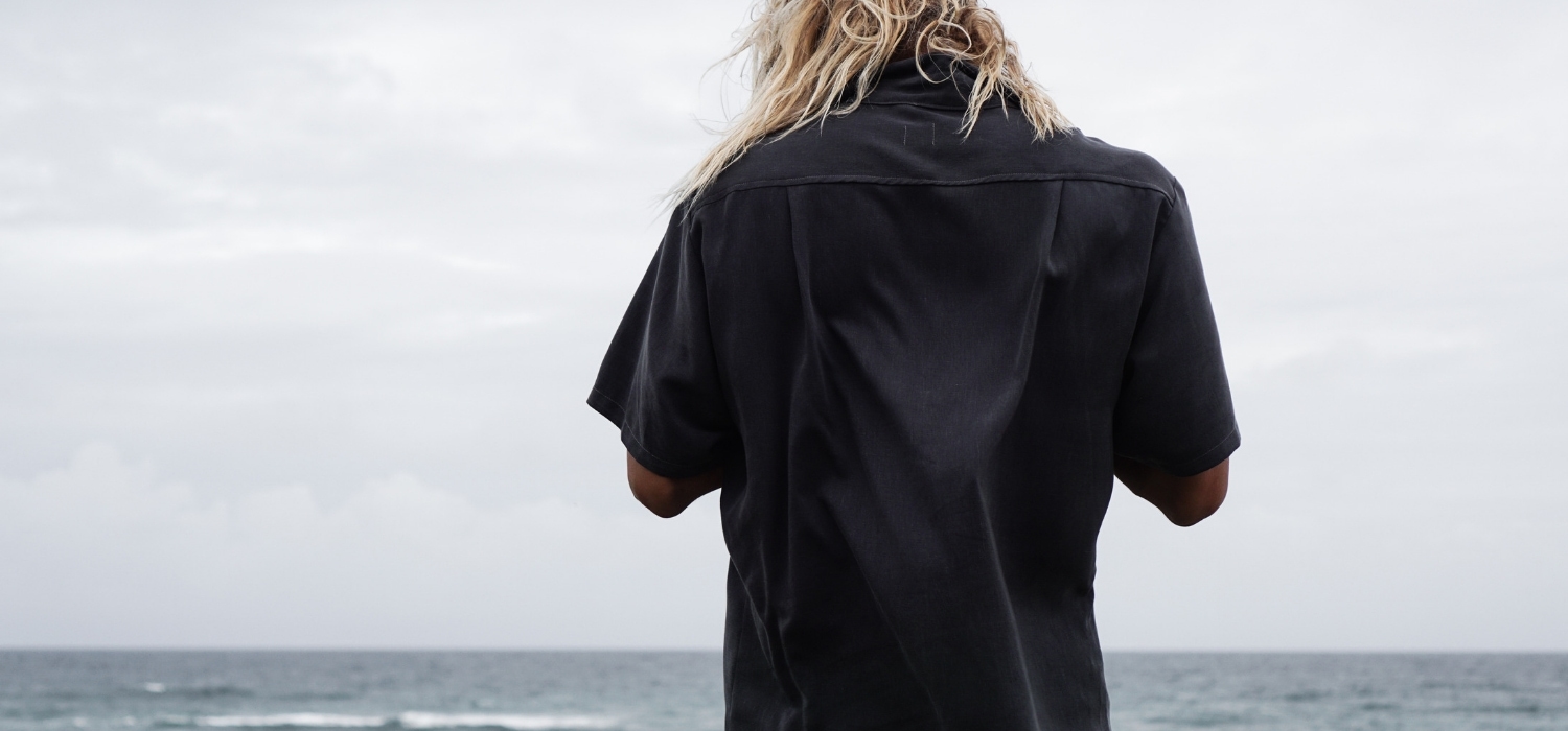 Tasi Travels' Men's Charcoal Long-Sleeve Voyager Shirt is handmade from a sustainable blend of Tencel & Hemp