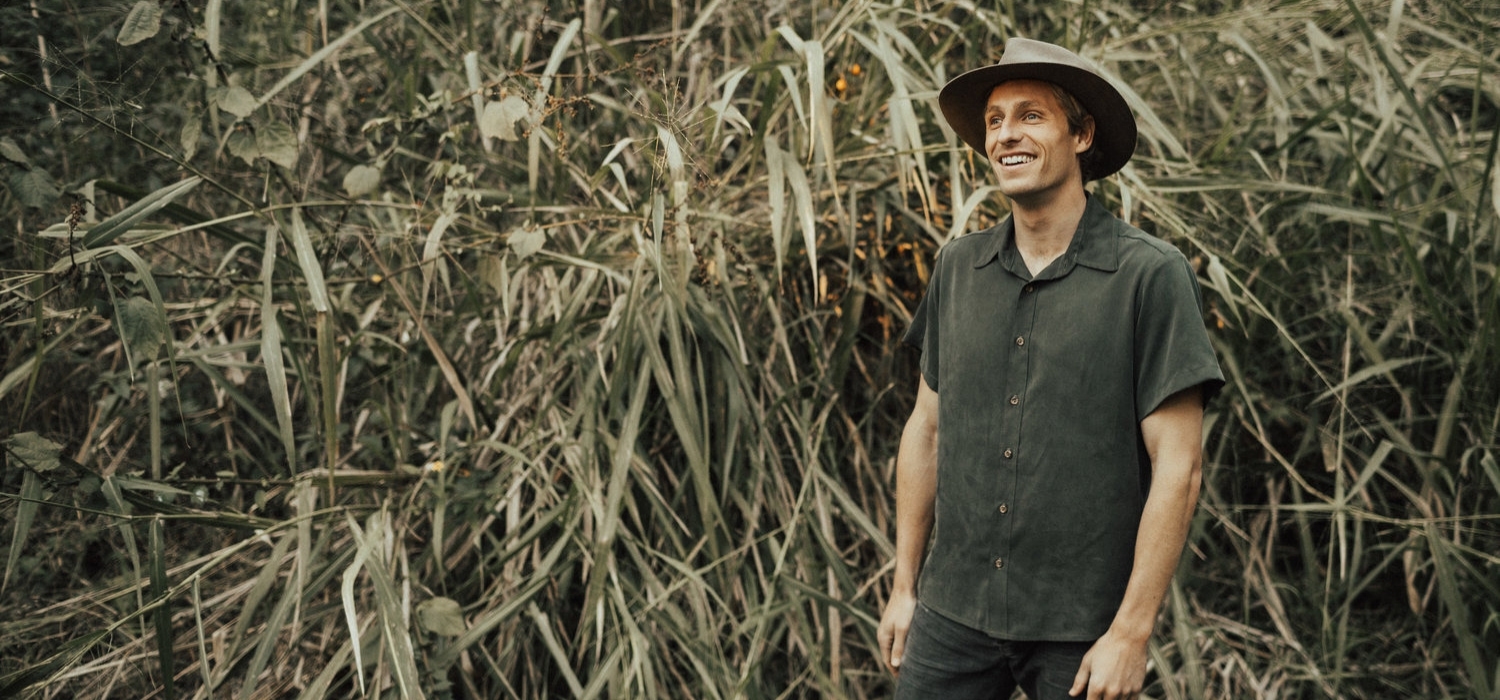 Tasi Travels' Men's Moss Short-Sleeve Voyager Shirt is handmade from sustainable Tencel