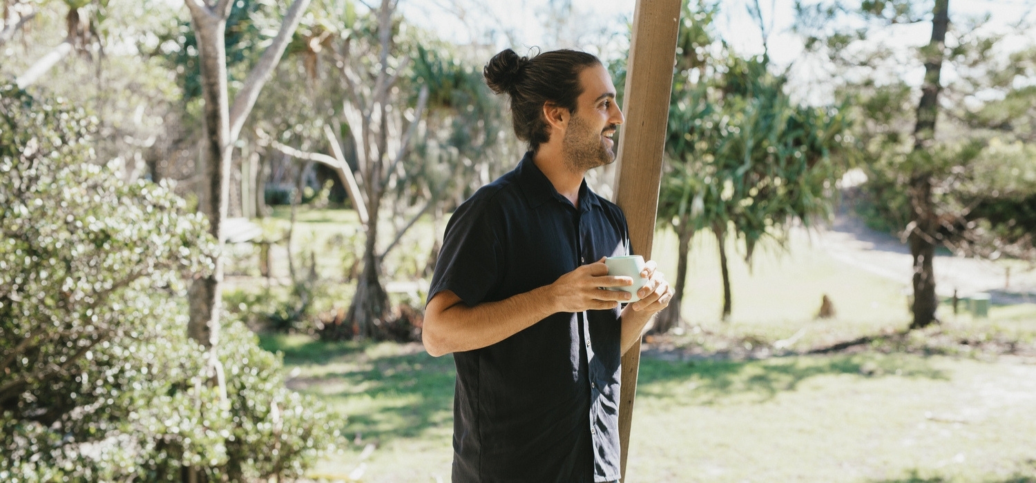 Tasi Travels' Men's Black Short-Sleeve Voyager Shirt is handmade from sustainable Tencel