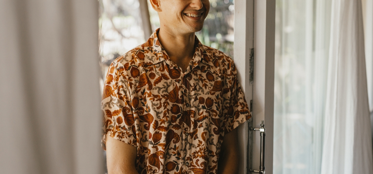 Tasi Travels' Men's Native Paisley Short-Sleeve Voyager Shirt is handmade from sustainable modal