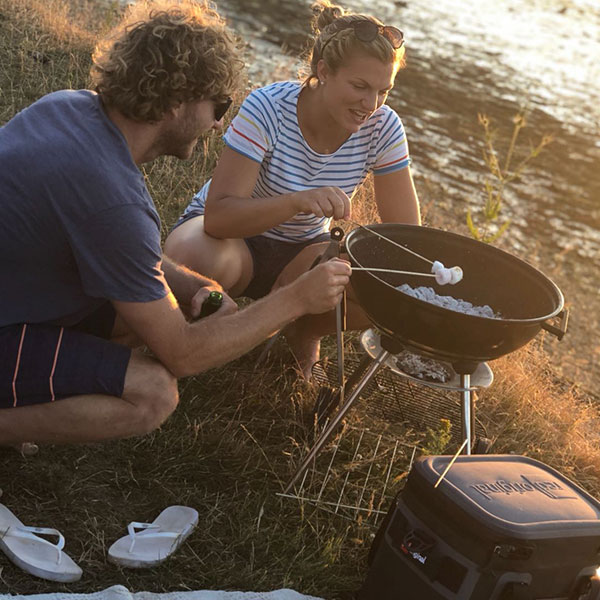 Toasting marshmallows on a BBQ