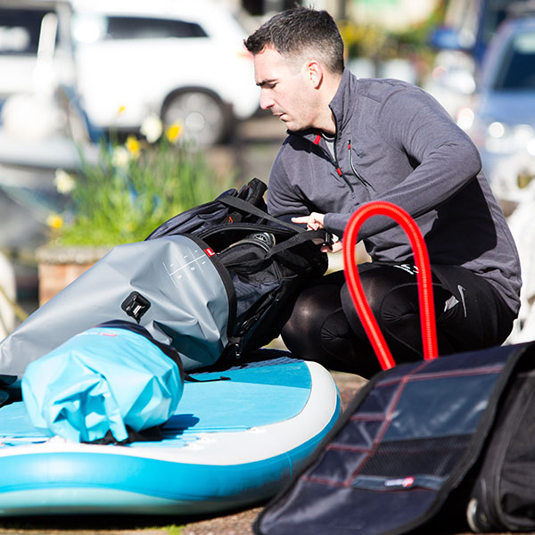 Male packing dry bag