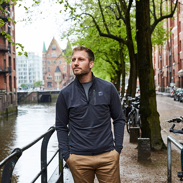 Man wears Performance Top layer