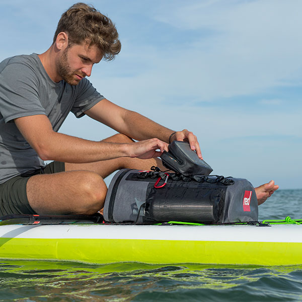 Man using a Deck Bag on the water.