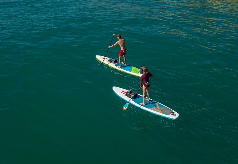 red paddle paddling boards