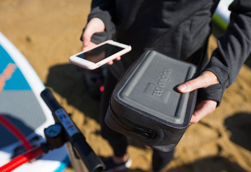 Putting a phone inside the Red Original Dry Pouch