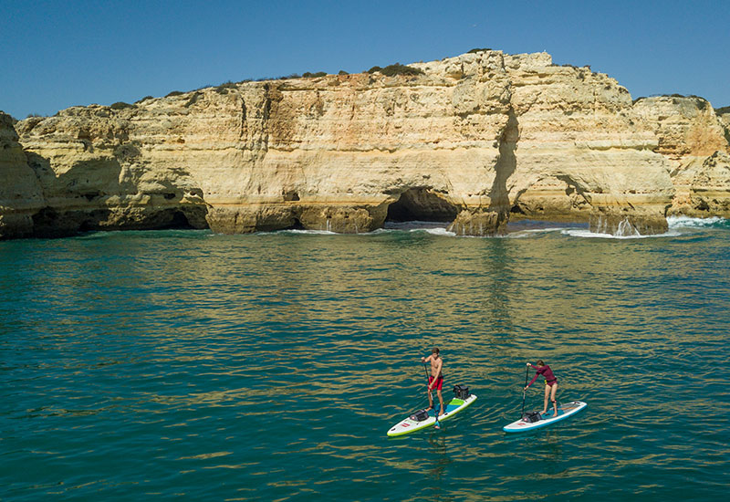 Couple paddle boarding