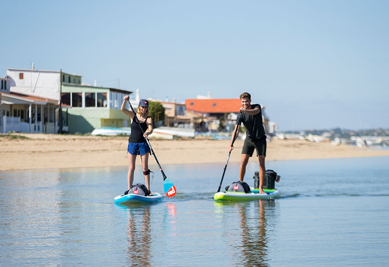 Couple paddle boarding