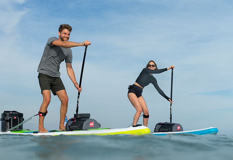 Couple paddle boarding wearing Red Original Mens Performance T Shirt