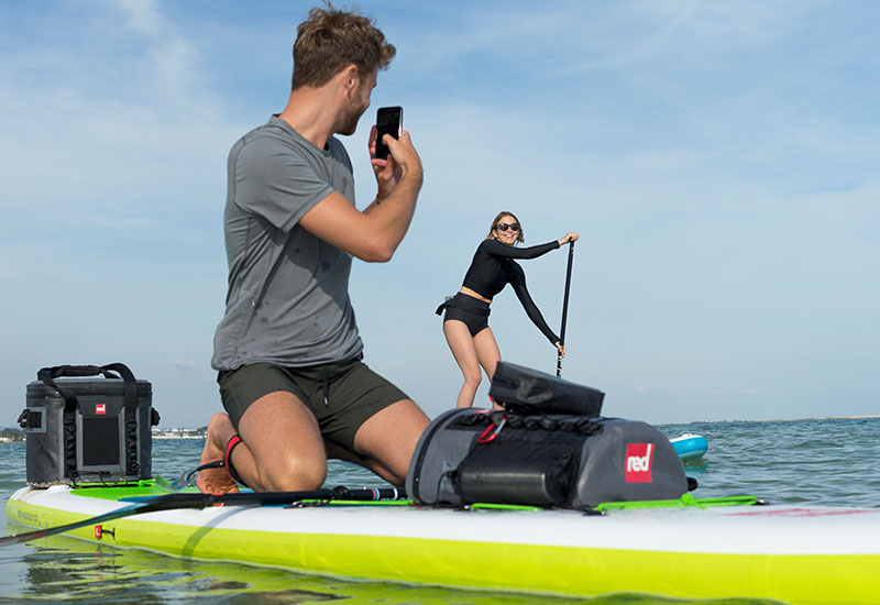 Taking a photo from an sup after removing phone from a Red Original Dry Pouch